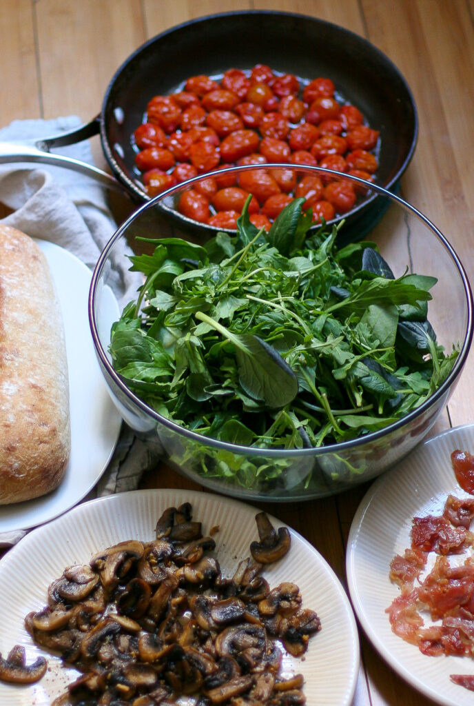 Sauteed Mushroom Salad with Crispy Prosciutto, Blistered Tomatoes, and Gruyere